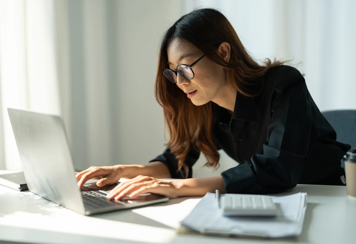 Business owner managing her Singapore company with Grof